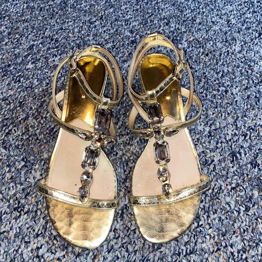Micheal Kors gold sandal with gems stones. Size 7